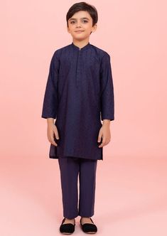 Refreshing two-piece fine cotton suit for your little one in navy blue featuring all over embroidery.Straight KurtaAll over embroidery on shirt front, sleeves and back yoke, Plain Back, Plain SleevesColor: Navy BlueFabric: Fine CottonStraight TrousersColor: Navy BlueFabric: Cambric Cotton Kurta With Set-in Sleeves For Eid, Indigo Cotton Sets With Dabka Detailing, Eid Pant Set With Long Set-in Sleeves, Casual Cotton Lawn Suit With Long Sleeves, Indigo Long Sleeve Set For Festive Occasions, Casual Long Sleeve Cotton Lawn Suit, Blue Cotton Pant Set With Straight Kurta, Cotton Long Sleeve Pant Set For Eid, Festive Blue Cotton Pant Set