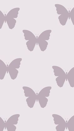 a purple butterfly pattern on a light gray background with white outlines in the middle