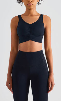 The EMES SHOP sports bra details a soft buttery touch that exemplifies comfort in sportswear. Featuring a ruched front. this athletic wear will be your go-to for each workout session.MATERIAL: 80% Nylon. 20% SpandexMEASUREMENTS: Small | Bust: 32" in . Band: 27" in . Length: 30.5" in Medium | Bust: 34.5" in . Band: 29.5" in . Length: 31.5" in Large | Bust: 37" in . Band: 31.5" in . Length: 32.5" in MEASUREMENTS: Small | Bust: 81.3" cm . Band: 68.6" cm . Length: 77.5" cm Medium | Bust: 87.6" cm . Band: 74.9" cm . Length: 80" cm Large | Bust: 94" cm . Band: 81.3" cm . Length: 82.6" cm Leisure Wear Women, Seamless Sports Bra, Workout Session, Black Sports Bra, Dress With Cardigan, Bra Styles, Womens Bodysuit, Athletic Wear, Casual Shoes Women