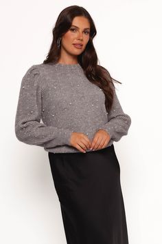 DETAILS    This cozy knit sweater features a classic round neckline and long sleeves with ribbed cuffs. Perfect for pairing with your favourite jeans or skirt, it's an eye-catching piece that you'll reach for time and time again.   round neckline  long sleeves with ribbed cuff  delicate pearl detail  unlined  material - 40% polyester / 15% acrylic / 15% wool    SIZING    studio model is 5' 7" and wears a Size S    model stats: bust - 33", waist - 27", hips - 36"        GARMENT CARE    I'm delica Cozy Knit Sweater, Cozy Knit, Cozy Knits, S Models, Favorite Jeans, Round Neckline, Knit Sweater, Heather Grey, Knitted Sweaters