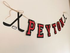 there is a banner that says peeton and hockeys on the string hanging from the wall