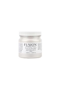 a jar of metallic paint on a white background with the words futon written in it