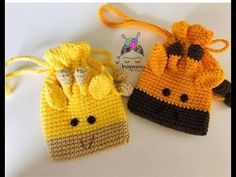 two small crocheted bags sitting next to each other