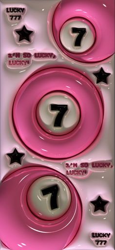 pink and white plates with black numbers on them