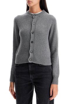 This Ami Paris crew neck cardigan is made of soft cashmere with ribbed edges. It has a short cut with a classic button closure and the 'Ami de Coeur' logo embroidered in tone on the chest. Regular fit. The model is 177 cm tall and wears size XS.Gender: WomenMaterial: 97%CASHMERE 3%WOOLColor: GREYMade in: IMPORTEDProduct ID: FKC157 005 052*Import tax/duty will be calculated at checkout (If applicable) Crew Neck Cardigan, Skirt Swimsuit, Dress Attire, Versace Outfit, Louis Vuitton Designer, Ami Paris, Pleats Please Issey Miyake, Short Cut, Knitwear Cardigan