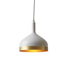 a white and gold pendant light hanging from a ceiling fixture with an orange cord attached to it