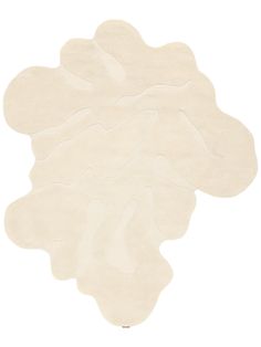 a white rug with an abstract design on it