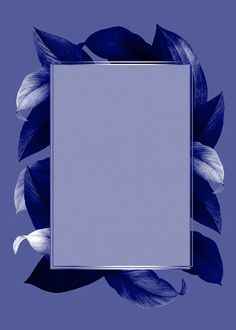 a blue and white photo frame with leaves on the bottom, in front of a purple background