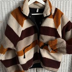 Free People Hit The Slopes Printed Fleece Jacket Rocky Ridge Striped Logo Brand New With Tags Snap Front And Logo Back Size: Small Retail Price: $168.00 Polyester & Lining Cotton Sporty Brown Outerwear With Fleece Lining, Sporty Orange Long Sleeve Outerwear, Cozy Orange Outerwear For Fall, Cozy Orange Winter Outerwear, Cozy Orange Long Sleeve Outerwear, Orange Long Sleeve Track Jacket For Fall, Orange Outerwear For Outdoor Activities In Fall, Long Sleeve Orange Track Jacket For Fall, Free People Hit The Slopes