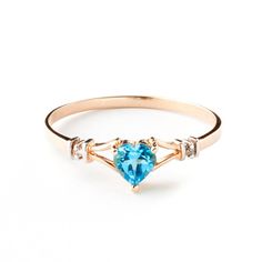 Item: 1277 Description 14k. Solid Gold Rings W/ Natural Diamonds & Blue Topaz (Rose Gold) Original Ring Size 6.50 (More Upon Request) Item Information Metal: 14k. Solid Gold Metal Weight: 1.40 Gr. Diamonds 2 Round Cut, K-M Color, Si-1 Clarity = 0.02 Ct Center Gemstone 1 Heart Shape, 5x5 Mm, Blue Topaz = 0.45 Ct Measurements Height: 0.85 In ( 21.6 Mm) Width: 0.24 In ( 6.1 Mm) Heart Wedding Rings, Topaz Yellow, Diamond Heart Ring, Topaz Color, Jewelry Lookbook, Solid Gold Rings, 14k Gold Ring, Gold Diamond Rings, Diamond Heart