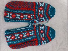 You or your loved one will spend a warm winter with booties with folkloric patterns. These soft, warm, and comfortable hand-knitted slippers are intended for indoor use only and very useful to give comfort your feet. They are ideal gift for family and friends. I try to ship most in-stock items within 24 business hours; I will need a few extra days for custom order requests.  All my items are handmade with love and attention to detail and, the items are made with attention to detail and using hig Blue Knitted Socks For Winter, Warm Winter Socks, Free Tote, Winter Socks, Knitted Slippers, House Shoes, Gift For Family, Acrylic Yarn, Warm Winter