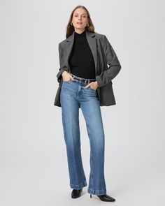 This sleek wide leg is designed with a high-rise and a flattering bow leg. This pair is crafted in PAIGE VINTAGE denim with a portion of organic cotton and comes in a light/medium wash with lived-in details. PAIGE VINTAGE takes all the work out of breaking in your favorite pair of vintage jeans. We've combined the comfort of stretch with everything you love about authentic vintage denim to create super soft jeans that feel perfectly lived-in from the very first wear. Eco-positive methods and mod Medium Wash Wide-leg Flare Jeans For Work, Chic Medium Wash Wide Leg Pants For Fall, Modern Denim Wide Leg Pants For Fall, Chic Wide Leg Pants In Denim Blue For Fall, Fall Medium Wash Cropped Wide Leg Pants, Fall Cropped Wide Leg Pants In Medium Wash, Modern Wide-leg Flare Jeans For Fall, Chic Denim Wide Leg Pants For Fall, Medium Wash Full Length Wide Leg Work Pants