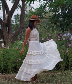 "Boho Maxi Full Circle Wedding Skirt Tiered full circle long skirt made from unbleached and undyed raw cotton in off-white color. Sizing: Made in one size to fit S to L / US: 4/6/8/10/12 Measurement; Elastic waist 24-40\" Hip max 50\" Length 41\" Bottom hem circumference 100\" **Model is a size US 6. 33\" bust, 36\" hip. 165 cm tall** Description: Stunningly beautiful maxi full circle skirt made from raw cotton material. Lined with the same fabric to knee level (not see-through). Full elastic wa Peasant Style Tiered Beach Maxi Skirt, Beach Tiered Peasant Maxi Skirt, Bohemian Tiered Wrap Skirt, Bohemian Fitted Tiered Wrap Skirt, Bohemian Tiered Dress With Relaxed Skirt, Bohemian Dress With Relaxed Tiered Skirt, White Relaxed Bohemian Maxi Skirt, Long Peasant Skirt For Beach, Peasant Style Long Beach Skirt