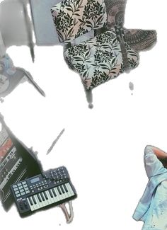 a collage of various musical instruments and music equipment, including a piano, keyboard, chair, and armrests