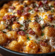 a casserole dish with meat and cheese on it, ready to be eaten