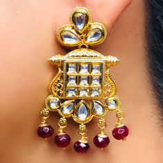 These are a beautiful pair of Earrings, made with beautifully Kundan beaded. These earrings work well with all types of clothing, whether it be formal attire or a casual party. Option 1 : Red Color (E722) Option 2 : White Color (E723) Eye-catching and unique jewellery that will set you apart. Gift this piece to a loved one, and see their face light up with joy. Best for gifting or for personal use, wear it to any occasion and be in the spotlight. Elegant Dangling Beads Earrings For Festivals, Elegant Dangling Beaded Earrings For Festivals, Elegant Beaded Earrings With Dangling Beads For Festivals, Elegant Beaded Earrings For Party And Festivals, Elegant Red Chandelier Earrings For Festive Occasions, Elegant Red Festive Chandelier Earrings, Festive Red Elegant Chandelier Earrings, Red Earrings For Formal Festive Occasions, Elegant Festive Beaded Chandelier Earrings