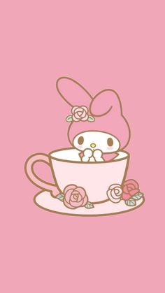 hello kitty in a teacup with roses on the saucer and behind it is a pink background