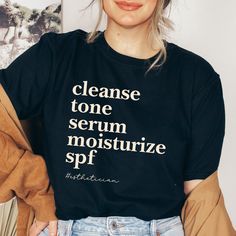 This esthetician shirt makes a totally unique esthetician gift. Grab this tee today while it's on sale! Delivery Times: ◦ Production: 2 business day on average (maximum: 3) ◦ Shipping: 3 business days on average (maximum: 5) Unisex Fit: ◦ Extra soft, preshrunk unisex t-shirt ◦ Women: Semi-fitted, laidback, rollable, & tuckable ◦ Men: Fitted on upper body & loose around the belly ☞ Size up for a looser fit Soft Materials: ◦ Super soft, preshrunk tee with eco-friendly materials ◦ Black, White, & N Esthetician Shirts, Esthetician Outfit, Esthetician Clothes, Esthetician Apparel, Facial Esthetician, Medical Esthetician, Esthetician Gifts, Esthetician Quotes, Skin Therapist