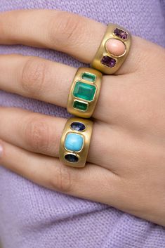 Luxury Three-stone Ring Jewelry, Modern Three Stone Yellow Gold Jewelry, Fine Jewelry Multi-stone Dome Ring, Heirloom Style Emerald Rings With Polished Finish, Luxury Wide Band Oval Ring With Polished Finish, Luxury Oval Wide Band Ring With Polished Finish, Luxury Multi-stone Round Band Jewelry, Luxury Multi-stone Open Ring Jewelry, Luxury Emerald Rings With Polished Finish