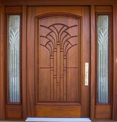 a wooden door with glass panels on the front and side doors are made of wood