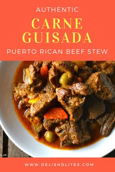 a white plate topped with beef stew next to an orange and red sign that says authentic carne gusada