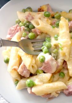 ham and pea pasta bake on a white plate with a green border overlay