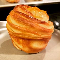 a close up of a pastry on a plate