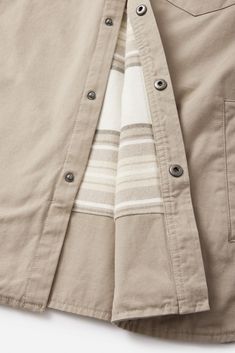 The Campbell Jacket is a 100% cotton button-down made from a canvas shell that offers a custom flannel body liner, poly sleeve liner, corduroy collar& gussets. Side welt pockets and patch chest pockets. 100% cotton canvas shell Corduroy collar Striped cotton flannel body lining Front snap closure Side welt& chest pockets | Campbell Jacket Men's Size Large Cotton in Olive by Katin Custom Flannel, Pant Shirt, Cotton Flannel, Welt Pockets, Winter Collection, Swim Shorts, Welt Pocket, Bottoms Pants, Shirt Jacket