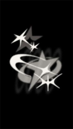 an abstract black and white photo with stars