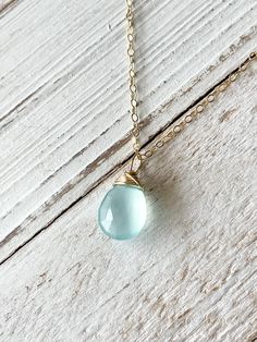 Aqua Blue Chalcedony pendant on gold fill 18" length chain. Great piece for layering multiple necklaces. Blue Delicate Chain Necklace, Gold Wire Wrapped Drop Necklaces, Gold Wire Wrapped Drop Necklace, Multiple Necklaces, Aqua Chalcedony, Blue Chalcedony, Gold Filled Chain, Aqua Blue, Pendant Necklaces