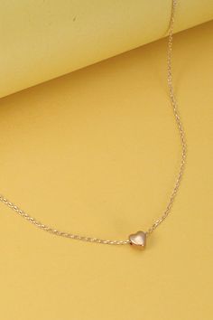 A collection of our petite line: "Mini Delicate Puffy Heart Chain Necklace" is a dainty and charming piece that effortlessly captures the essence of understated elegance. An extra meaningful heart necklace to keep it simple and perfect for women who love classic style! Gold dippedProduct Details:length: 16"charm: .25"ext: 3" clasp: Lobster Clawproduct: Lead & Nickel Compliant Rose Gold Charm Necklace With Heart Pendant, Rose Gold Heart Pendant Charm Necklace With Delicate Chain, Rose Gold Clavicle Chain Necklace For Valentine's Day, Minimalist Heart-shaped Delicate Chain Necklace, Minimalist Heart-shaped Chain Necklace, Minimalist Delicate Chain Necklace For Valentine's Day, Valentine's Day Rose Gold Charm Necklace With Delicate Chain, Minimalist Heart Pendant Chain Necklace, Minimalist Delicate Chain Necklace With Heart Pendant