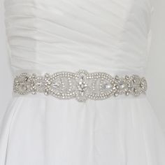 "This wedding sash belt is art deco inspired.  The beautiful motif is made of crystals, silver seed beads and bugle beads. The decorated part of this jeweled bridal belt is 12 inches long and  2\" at its widest.  It is perfect with a 1.5 inch luxurious Swiss double faced satin. The satin ribbon is  a generous 3.3 yards long : enough to make a gorgeous bow in the back." Dresses Fairytale, Delicate Wedding Dress, Tulle Corset, Belt For Dress, Wedding Dresses Hippie, Dresses Winter, Disney Wedding Dresses, Ballgown Wedding, Dresses Guest