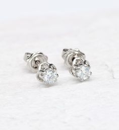 Real Diamond Studs set with Diamond, size 3 millimetres diameter each, 0.3 Carats a pair. Solid 18k White Gold ☞ made to last.Click here for ☞ Solid Gold CollectionDiamond Details:• CERTIFIED Natural Diamond • Weight: 0.3 Carats a pair• Dimensions: 3 millimeters each• Color: G• Clarity: I2• Cut: Very good• Fluorescence: Yes Setting Details:• 1.28 grams of 18k Solid White Gold• Dimensions: Length 14.4mm, Width 4mm• None Tarnish - Perfect for everyday use - Lasts a lifetime *Final weight & dimensi Classic White Gold Earrings With Single Diamond, White Gold Earrings With Single Diamond For Anniversary, Fine Jewelry Single Diamond Round Earrings, Elegant 14k White Gold Earrings With Single Diamond, 14k White Gold Round Diamond Earrings, Fine Jewelry Round Earrings With Single Diamond, 14k White Gold Solitaire Earrings, Formal 14k White Gold Earrings With Single Diamond, Fine Jewelry White Gold Earrings With Single Diamond