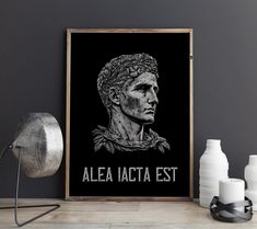 a black and white photo with the words alea laccta est on it next to some vases