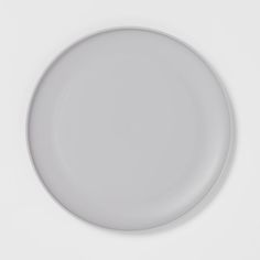 an empty white plate on a white background