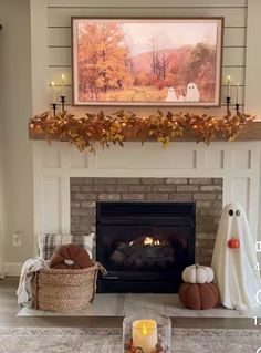 the fireplace is decorated with candles and decorations