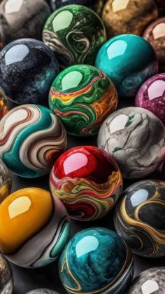 colorful marbles are stacked on top of each other