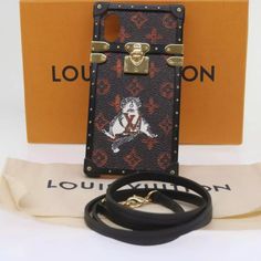 Items With The Grading B Are In Very Clean Condition. There Are Small Signs That The Item Has Been Used Previously But In General They Are Very Tidy. Brand Louis Vuitton Color Black Material Metal / Monogram Canvas Size(Cm) W8cm X H15.5cm X D1.5cm(Approx) Size(Inch) W3.1 X H6.1 X D0.6inch(Approx) Style Iphone Case Accessory Dust Bag / Item Box / Shoulder Strap Product No. M63891 Made In Spain Serial No. Bc4108 Rank B Condition Outside Surfaceslight Rubbing Shoulder Strapslight Rubbing Metal Fittingsslight Scratches Inside - Pocket - Corner Slight Rubbing Odor No Offensive Odor To Us. Louis Vuitton Accessories, Small Signs, Phone Case Accessories, Monogram Canvas, Canvas Size, Inside Pocket, Trunk, Cat Eye, Iphone Case