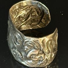 Thank You For Looking At This One Of A Kind Handmade Bracelet Repurposed From A Very Rare Antique From The Victorian / Art Nouveau Era. This Is Tested Solid Sterling Silver That Is Over 100 Years Old. This Motif Is Of A Lady Face From The American Beauty Collection The Sterling Is Tested This Is Similar To The Spoon Ring Type Jewelry, The Sterling Is Upcycled, And Sustainably Preserved Into Jewelry . This Is My Original Creation And Concept 11.3 Grams Of Sterling -Light Weight 1.25 Inches Wide F Adjustable Silver Fusion Cuff Bracelet, Handmade Fusion Metal Cuff Bracelet, Handmade Fusion Style Metal Cuff Bracelet, Handmade Metal Fusion Cuff Bracelet, Adjustable Silver Cuff Bracelet Wearable Art, Artistic Silver Cuff Bangle Bracelet, Artistic Silver Cuff Bracelet Bangle, Artistic Silver Cuff Bracelet, Artistic Metal Cuff Bracelet Bangle