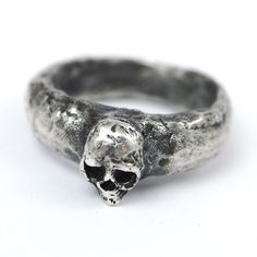 This chunky shanked, butvpetite skull pinky finger ring in solid sterling silver will be crafted from scratch according to your US ring size. Please make sure to write me your US ring size upon purchase. Every piece you see in my shop can be personalised, embellished with gemstones or can be cast in a different metal altogether: In sterling silver instead of brass or in gold. I'm here, waiting for a message from you for bespoke orders. I design and craft, refine everything myself. Only the casting is done at a old school workshop outside the famous Grand Bazaar, which is still the heart of all silver, gold, brass and bronze manufacturing.  I do not accept returns.  Shipment: I use the turkish shipment company Shipentegra, which ships items to the States in 7-14 days. Entegra Lojistic; ship Hand Cast Silver Skull Promise Ring, Sterling Silver Skull Ring For Promise, Hand Cast Sterling Silver Skull Ring, Unique Hand Cast Skull Rings, Hand Cast Gothic Skull Ring In Sterling Silver, Gothic Hand Cast Sterling Silver Skull Ring, Unique Hand-cast Skull Ring, Pinky Finger Ring, Pinky Finger