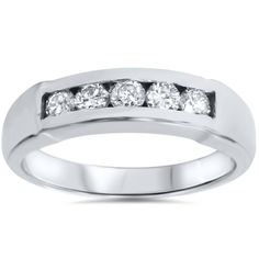 a white gold ring with five diamonds