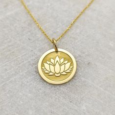 "14k Lotus Pendant, Gold Lotus Flower, Yoga Necklace, Lotus Charm, Gold Coin Necklace, Lotus Jewellery, Dainty Gold Necklace, ▪️ A beautiful and clean engraved Lotus Flower pendant made out of 14K Solid Real Gold. Available only in yellow gold! Pendant Thickness: 0.50mm Jump Ring inner diameter: 4mm Dimensions - Small - 16x16mm / 0.62 x 0.62 inches Medium - 18x18mm / 0.70 x 0.70 inches Big - 20x20mm / 0.78 x 0.78 inches Necklace Length - You can choose your chain length from 35CM to 50CM. The pe Spiritual Yellow Gold Jewelry With Birth Flower, Spiritual Yellow Gold Birth Flower Jewelry, Spiritual 14k Gold Flower Pendant Jewelry, Symbolic Gold Flower Pendant Jewelry, 14k Gold Spiritual Flower Pendant Jewelry, Yellow Gold Plated Jewelry With Birth Flower, Yellow Gold-plated Jewelry With Birth Flower Detail, Yellow Gold Round Pendant With Flower Charm, Yellow Gold Flower-shaped 14k Stamped Jewelry