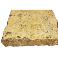 an old stone slab is shown on a white background with no people or objects around it