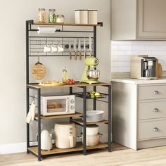 17 Stories 35.4'' Wood Standard Baker's Rack with Microwave Compatibility & Reviews | Wayfair Kitchen With Shelving, Microwave Stand Ideas, Counter Space Ideas, Liquor Bar Cabinet, Organiser Cucina, Extra Counter Space, Microwave Shelf, Steel Cupboard, Baker's Rack