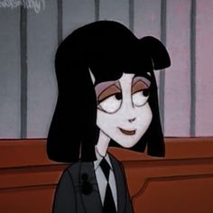 an animated image of a woman in a suit and tie sitting at a desk with her eyes closed