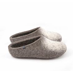 Organic house slippers with extra wool on the sole for a nice cushy feel. These Felted Slippers for men are low at the back for easy slip on.  Handmade out of natural organic mountain sheep wool feature a white patch decoration at the front. These slippers are also suitable for wide fit. Please write us a note at checkout with your measurements.Seamless luxury for your loved one, a superb gift for him. SIZESFOR SPECIAL SIZING NEEDS PLEASE INDICATE YOUR SIZE WITH YOUR ORDER. We make all sizes fro Felted Wool Slippers, Wool Clogs, Grey Slippers, Blue Slippers, Slippers For Men, Comfortable Slippers, White Patches, Winter Slippers, Wool Slippers