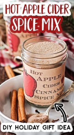 hot apple cider spice mix in a jar with cinnamon sticks