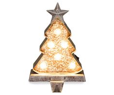 a christmas tree shaped light fixture with lights on the top and bottom, sitting in front of a white background