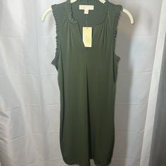 Michale Kors Ivy Shift Dress In Olive Green. 95% Polyester, 5% Elastane Sleeveless, V-Neck, Shift, Solid, Shirring, Ruffled Neck And Arm Pits, Edges, Green, Knee Length. This Is Nwt. Retails: $98 Casual Green Sleeveless V-neck Dress, Chic Green Sleeveless V-neck Dress, Green Stretch V-neck Sleeveless Dress, Green V-neck Stretch Sleeveless Dress, Green V-neck Sleeveless Stretch Dress, Green Sleeveless V-neck Dress, Casual Fitted Sleeveless V-neck Dress, Green Sleeveless Casual V-neck Dress, Green Sleeveless V-neck Dress For Summer