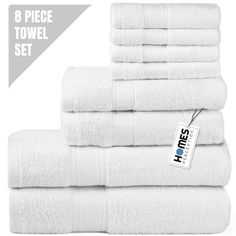 6 piece towel set in white with tags on each one and four towels stacked up